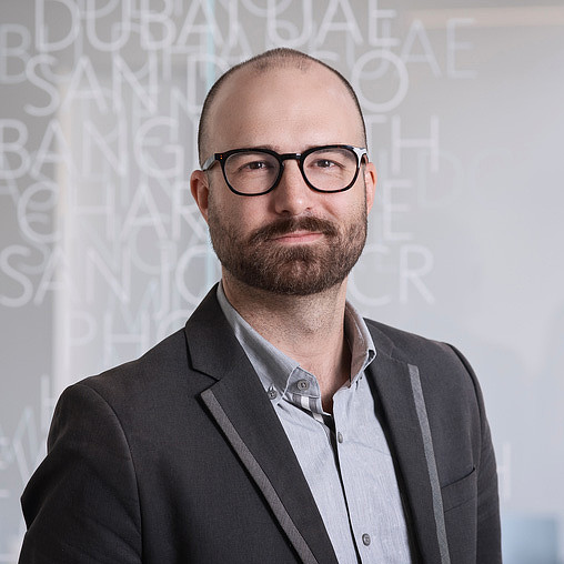 A man wearing glasses.