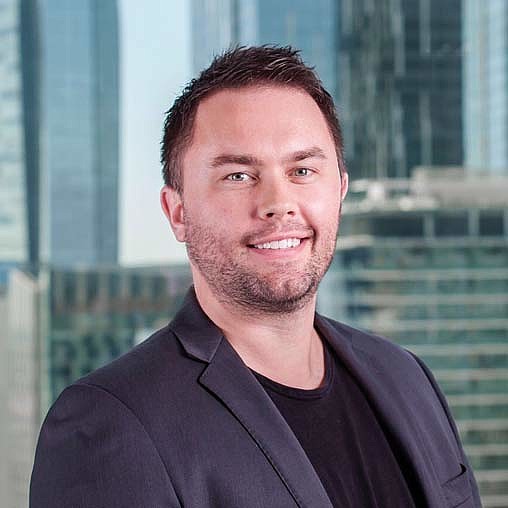 A man smiling for the camera.