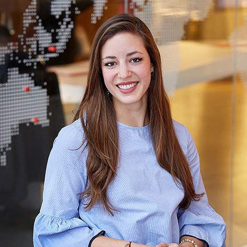 A person smiling at the camera.