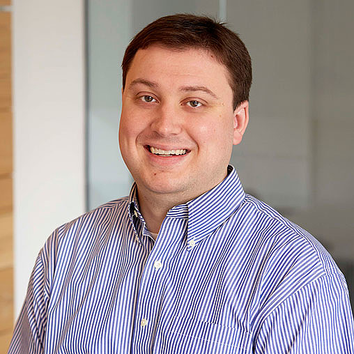 A man smiling for the camera.
