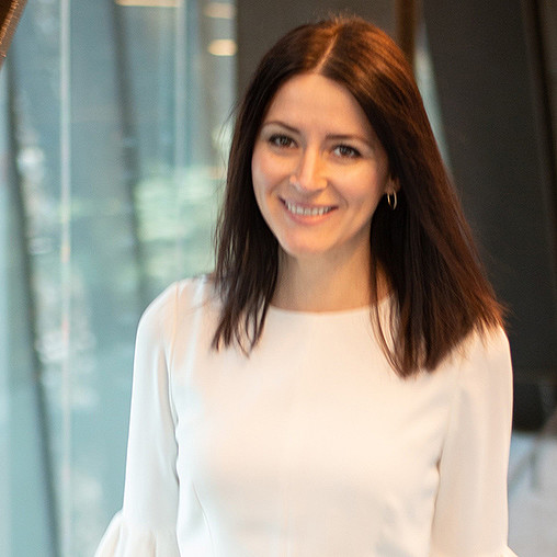 A person smiling for the camera.
