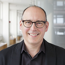 A man wearing glasses.