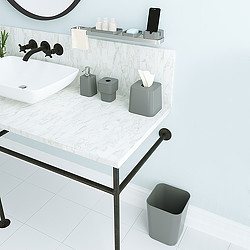 A bathroom with a sink and a mirror.