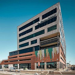 A large building with a sign on it.