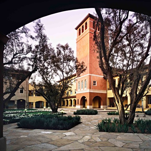 A building with trees in front of it.