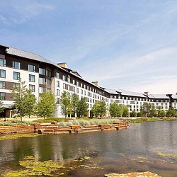 A body of water with buildings along it.