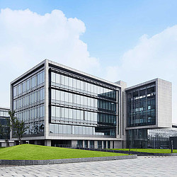 A modern building with glass walls.