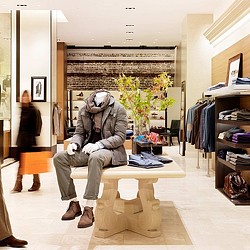 A person sitting on a bench.