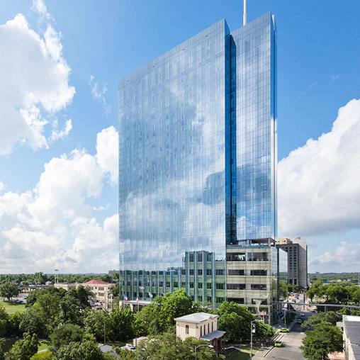 A tall glass building.