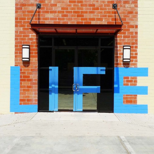 A building with blue doors.