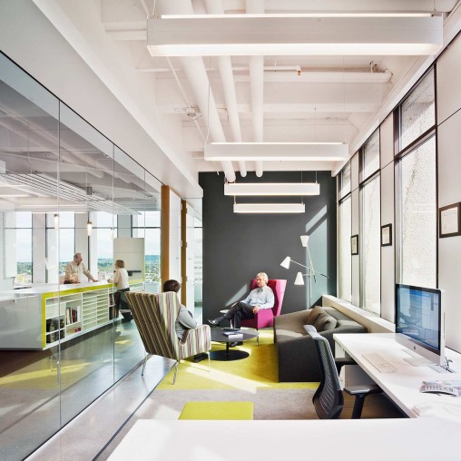 A few people in an office.