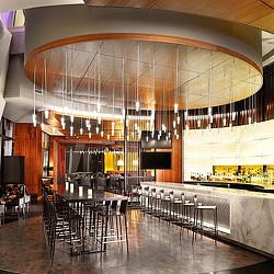 A large room with tables and chairs.