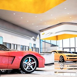 A red car parked in a parking garage.