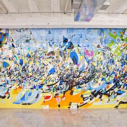 A wall with graffiti.