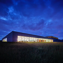A building with a glass front.