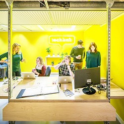 A group of people in a room.