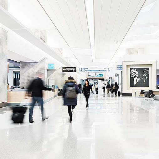 People walking in a large building.