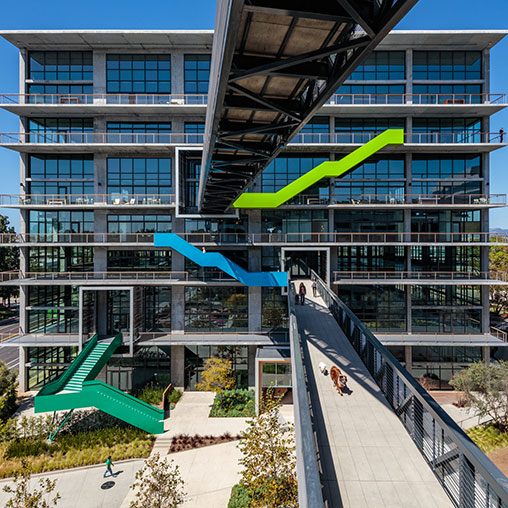 A building with a green slide.