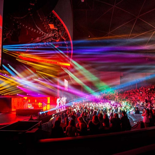 A stage with a crowd of people.