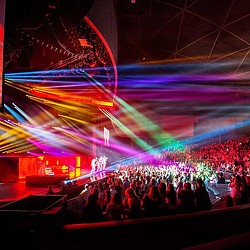 A stage with a crowd of people.