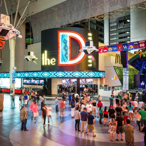 A group of people in a mall.