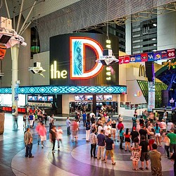 A group of people in a mall.