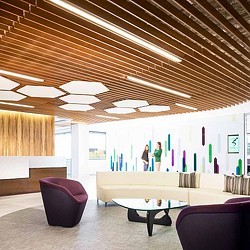 A room with a table and chairs.