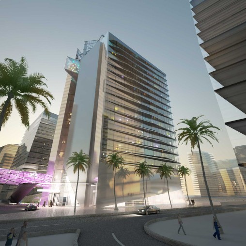 A tall building with palm trees.