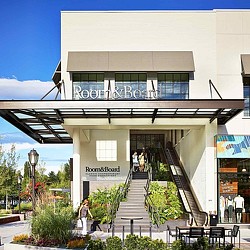 A building with stairs and a sign.