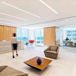 A person walking in a room.