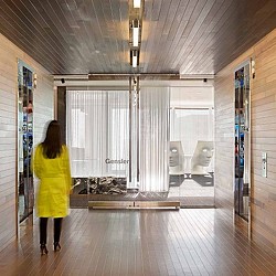 A person walking in a room.