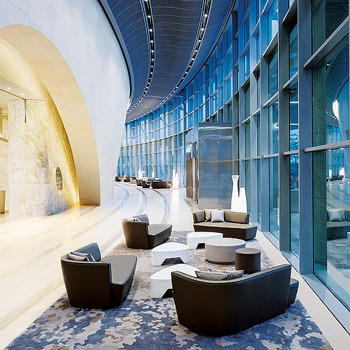 A room with couches and a glass ceiling.