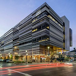 A building with a large glass front.