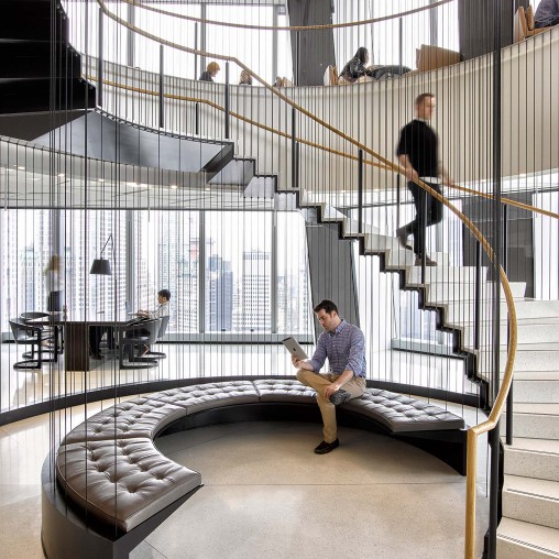 A person sitting on a staircase.