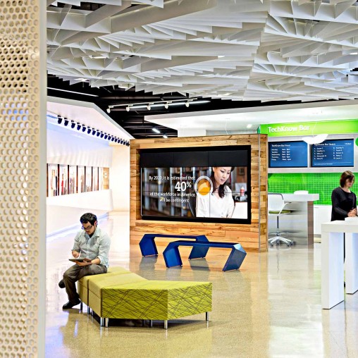 A man and woman in a library.