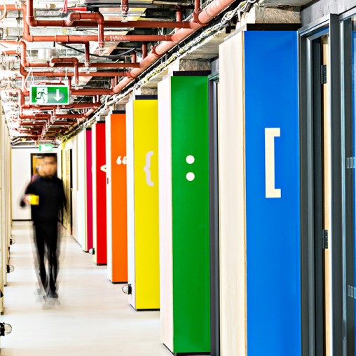 A person walking in a hallway.