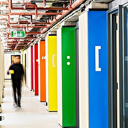 A person walking in a hallway.