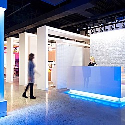 A person standing in a hallway.