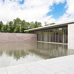 Barcelona Pavilion with a pool of water.