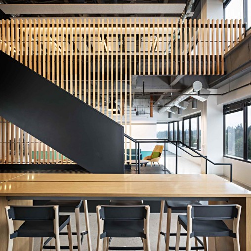 A room with tables and chairs.