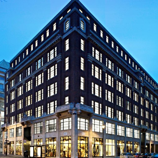 A tall building with many windows.