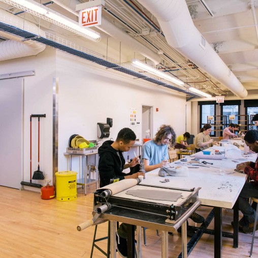 A group of people working in a room.