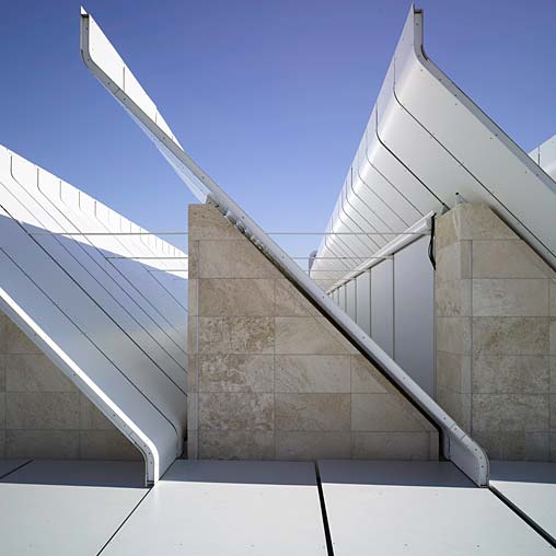A white bridge with a curved top.