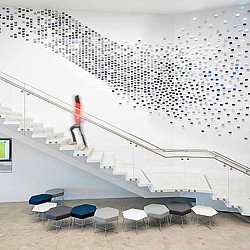 A person standing on a ladder.