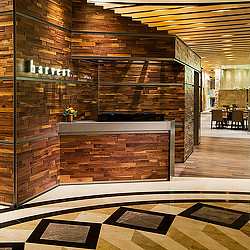 A room with a fireplace and a tile floor.