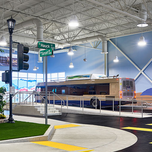A train is parked in a train station.
