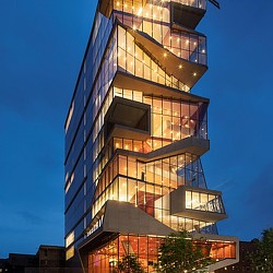 A tall building with many windows.