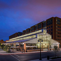 A large building with a glass front.