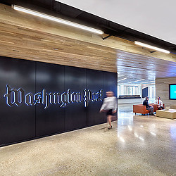 A person walking in a room.