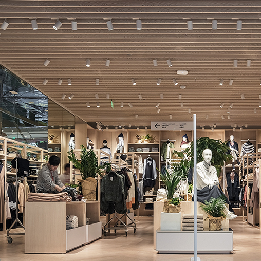 A store with a few people.